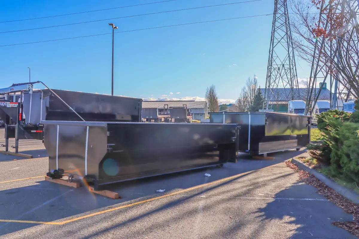Roll-off dumpster ready for waste disposal at job site for Commercial Dumpster Rental in River Ridge